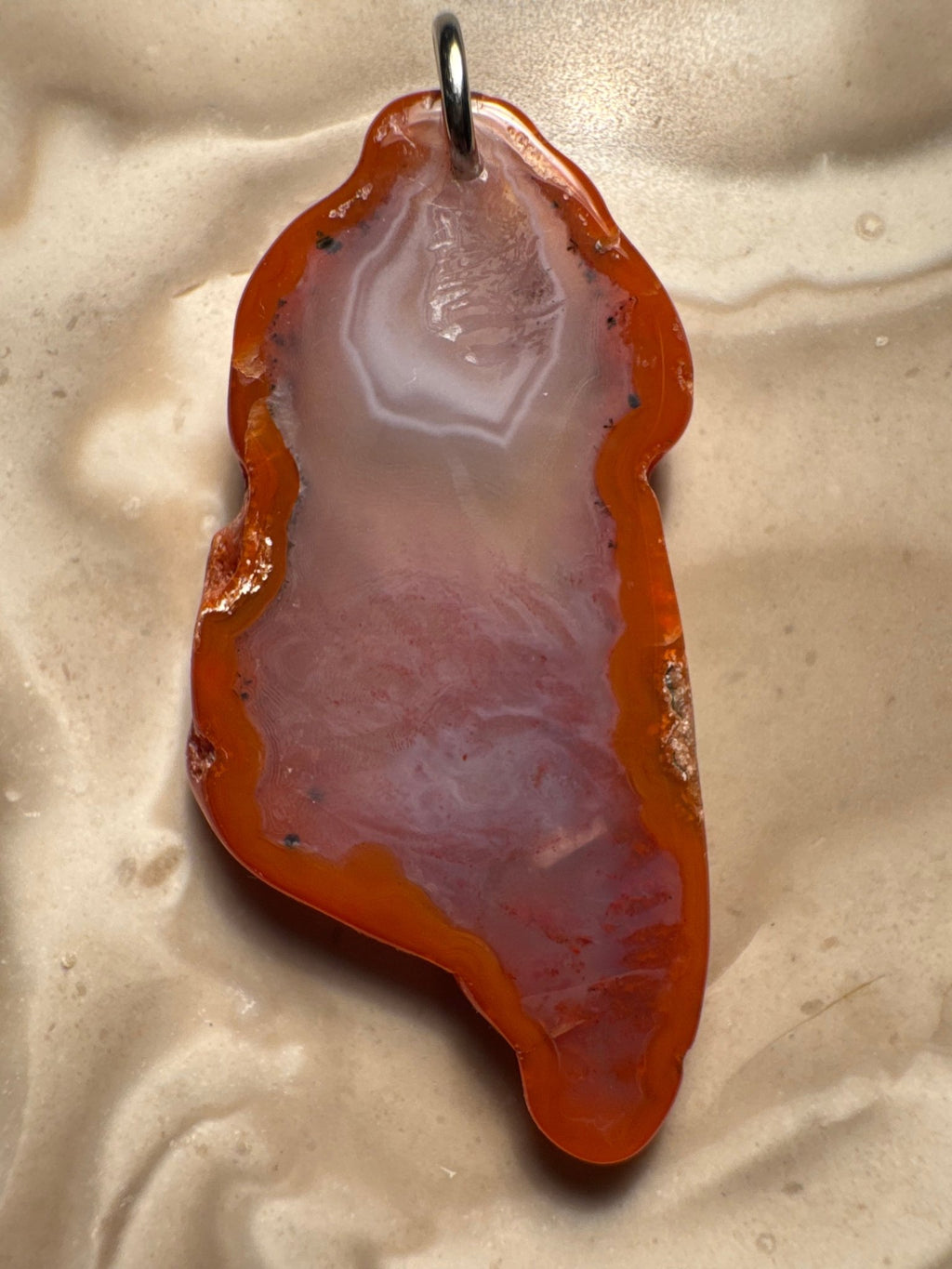 Agate pendant with bright orange