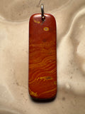 Handmade polished ore jasper pendant
